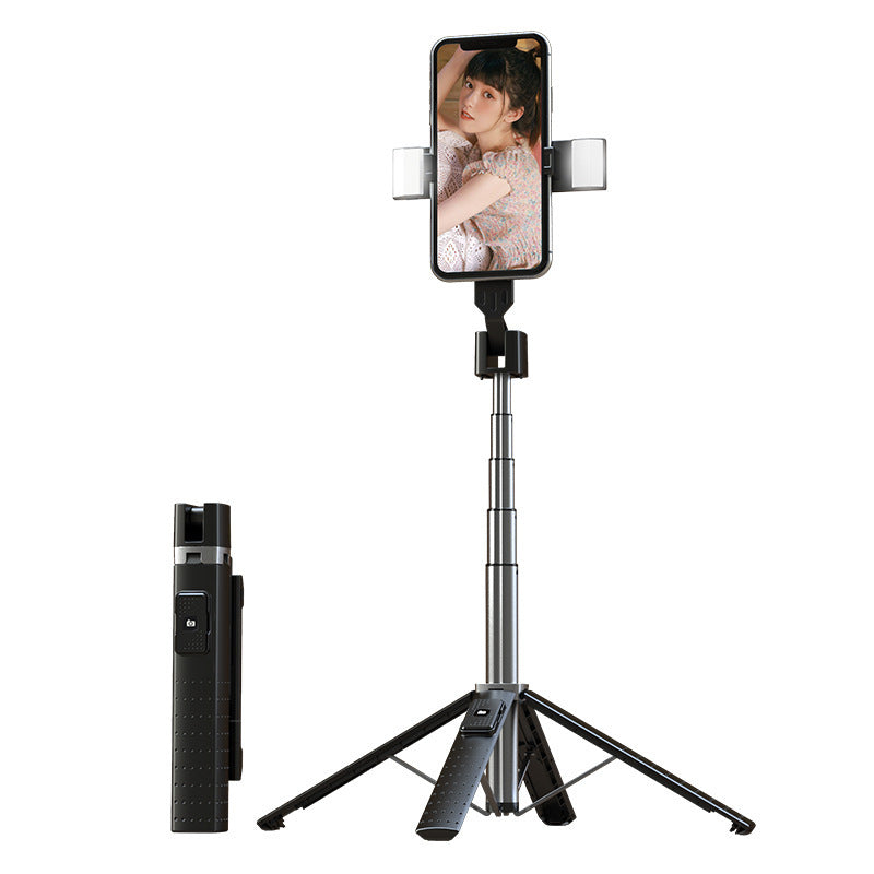 Phone holder with tripod and remote control on a white background