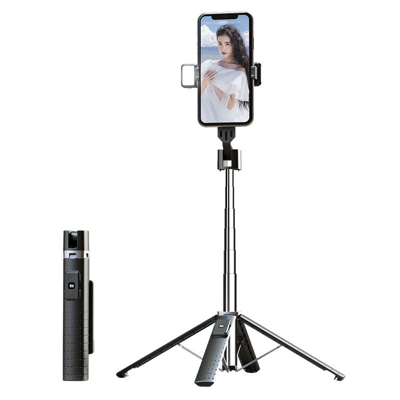 Phone holder with tripod and remote control on a white background