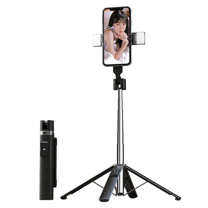 Phone holder with tripod and remote control on a white background