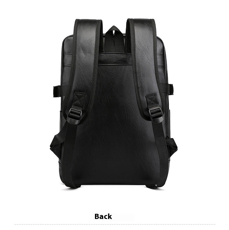 Black backpack shown from the back on a white background