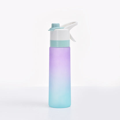 Gradient-colored water bottle with a white cap on a light gray background