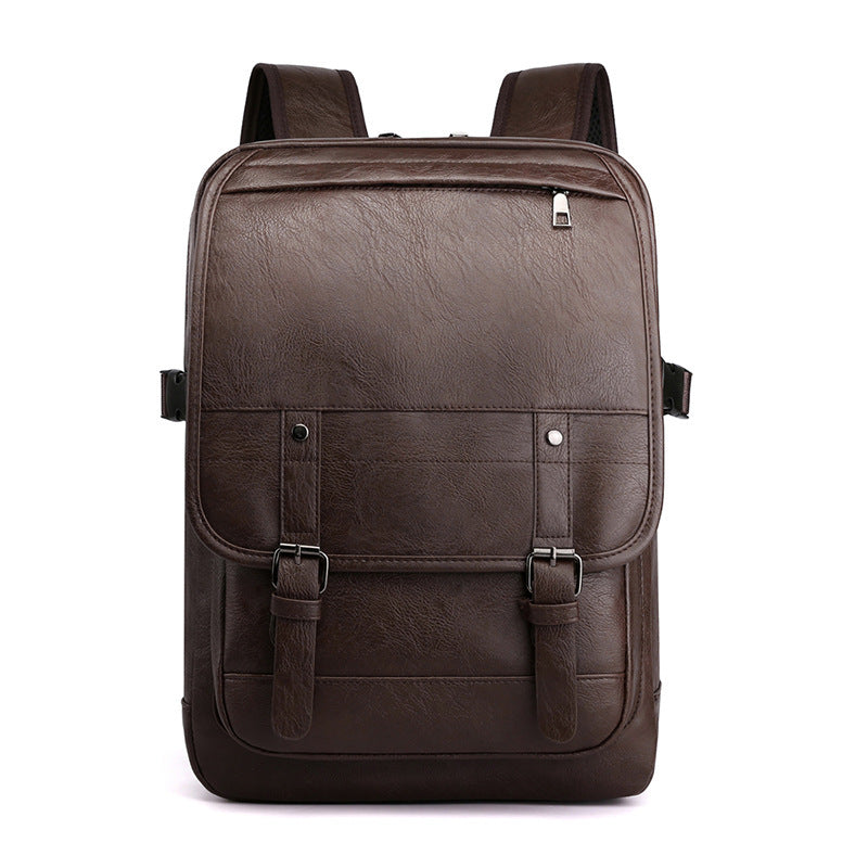 Brown leather backpack on a white background
