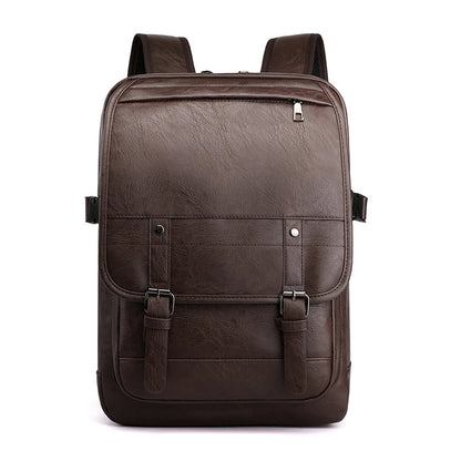 Brown leather backpack on a white background