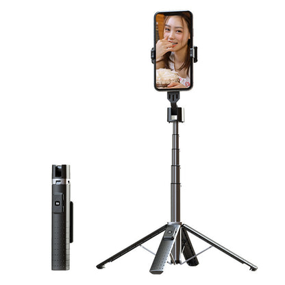 Phone holder with tripod and remote control on a white background