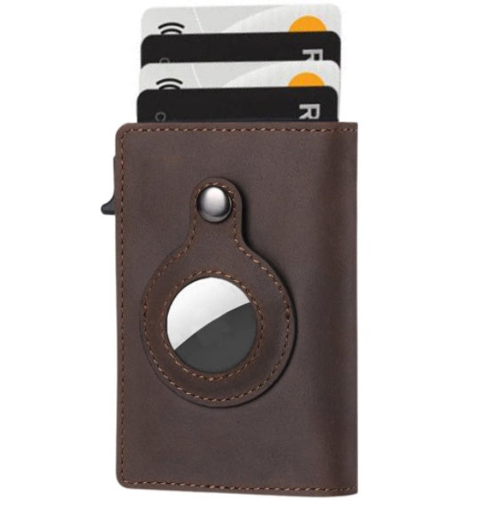 Brown leather cardholder with metallic accents on a white background