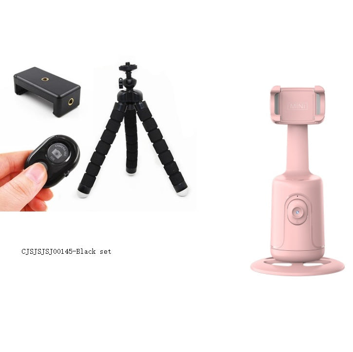 Collection of photography accessories including a pink device, black tripod, and remote control on a white background.