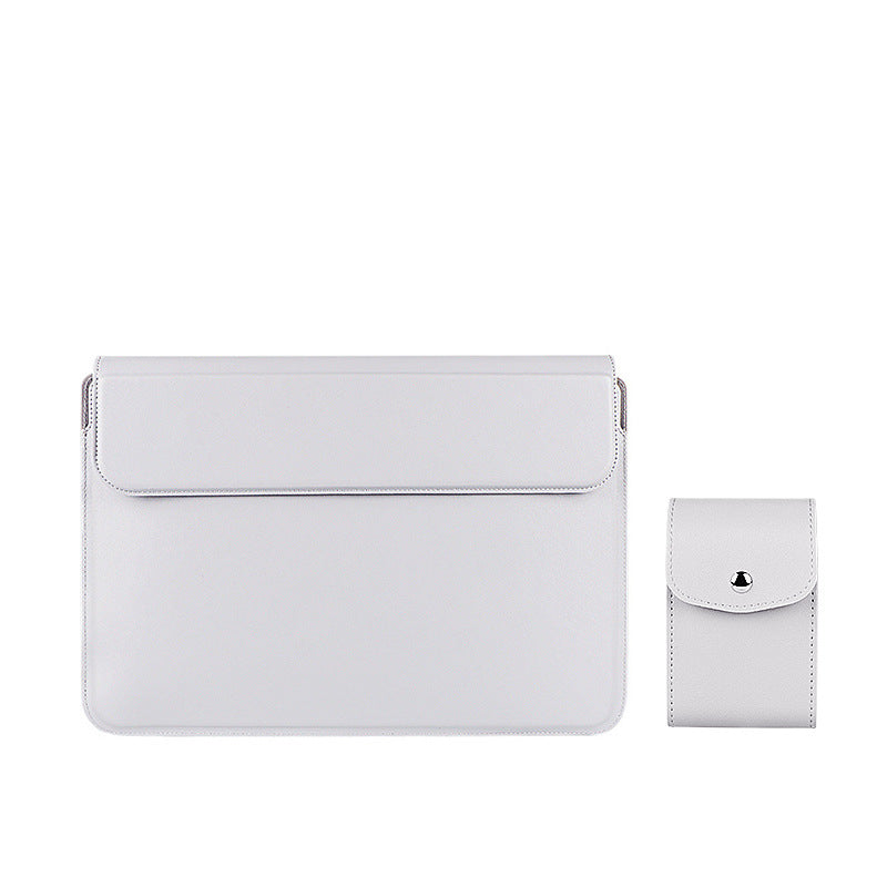 White clutch bag with a smaller pouch on a white background