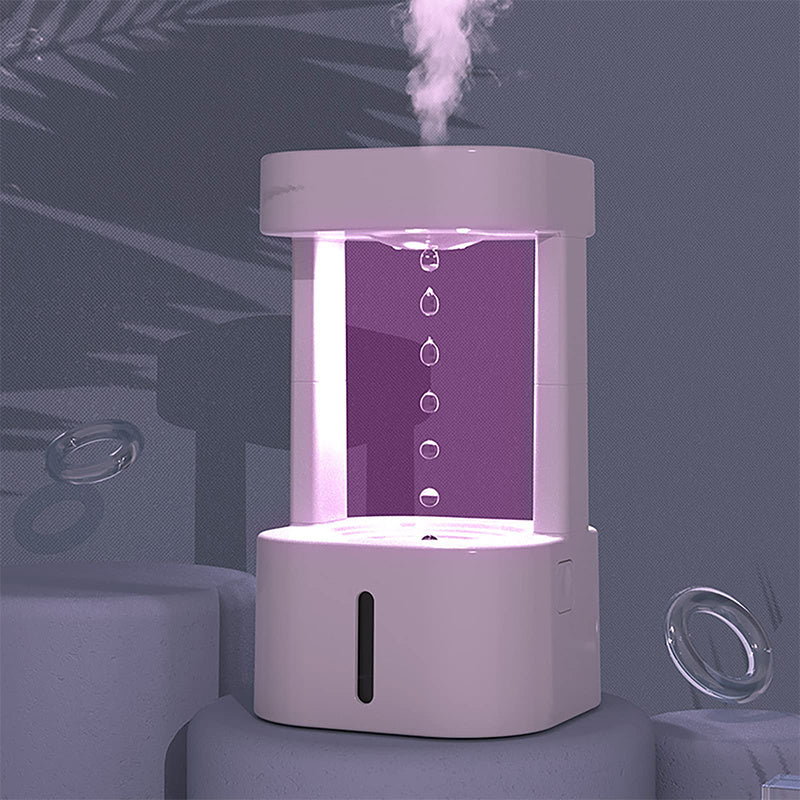 White humidifier emitting mist on a dark background