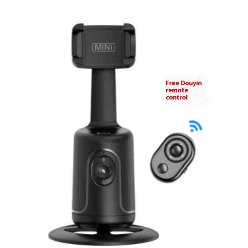 Black camera with remote control on a white background