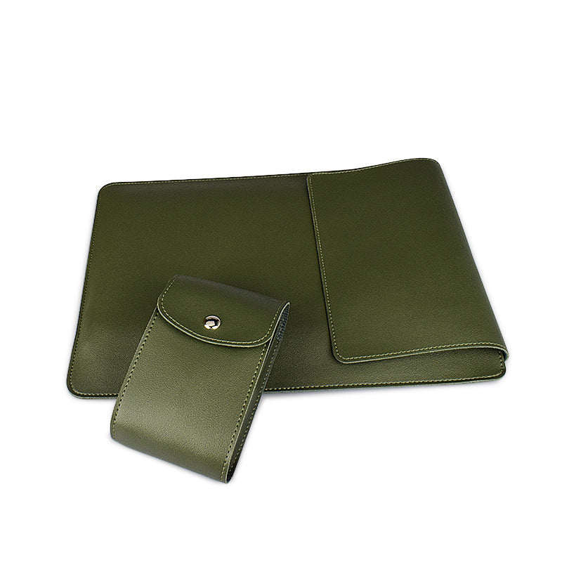 Green leather clutch and cardholder on a white background