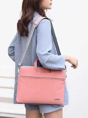 Woman carrying a pink backpack with a plain background
