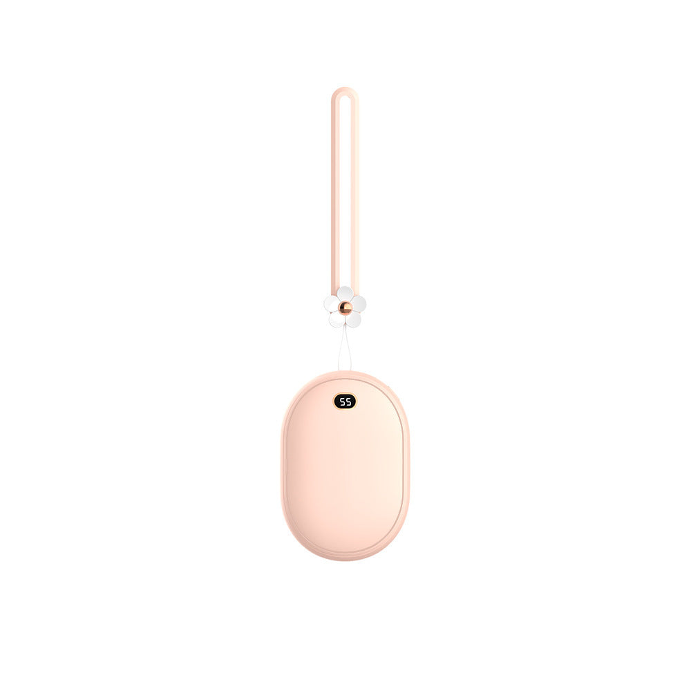 Pink handheld warmer with a hanging strap on a white background