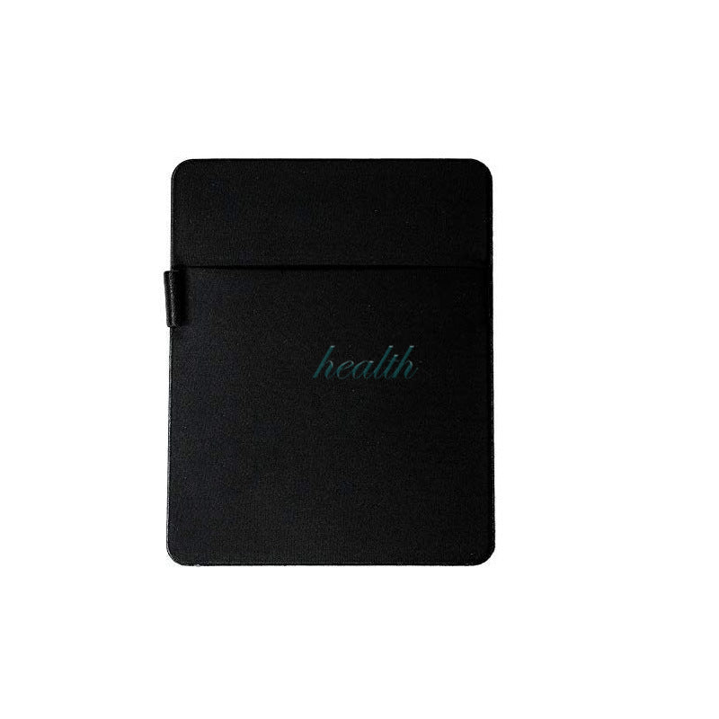 Black notebook with 'health' embossed on it on a white background