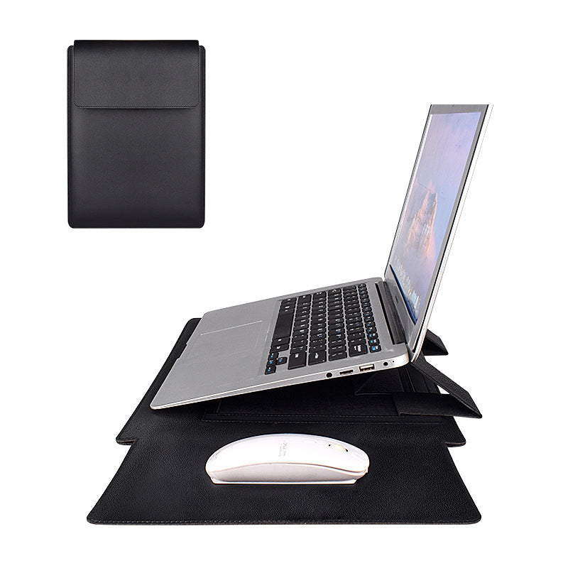 Laptop on a stand with mouse and black pouch on a white background