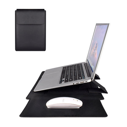 Laptop on a stand with mouse and black pouch on a white background