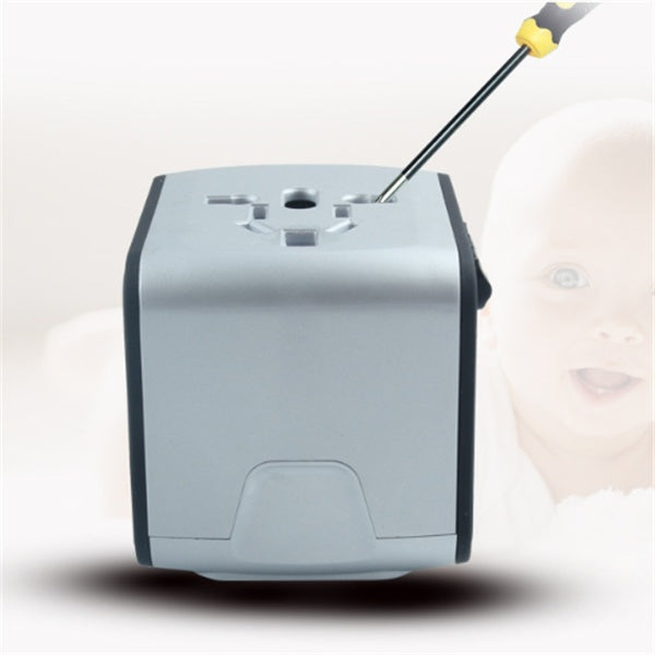Gray travel adapter with a screwdriver on a white background
