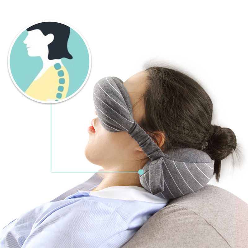 Person wearing a gray neck pillow with a close-up inset showing spine alignment.