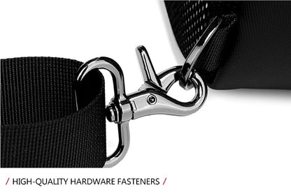 Close-up of a black strap with a silver hardware fastener on a white background