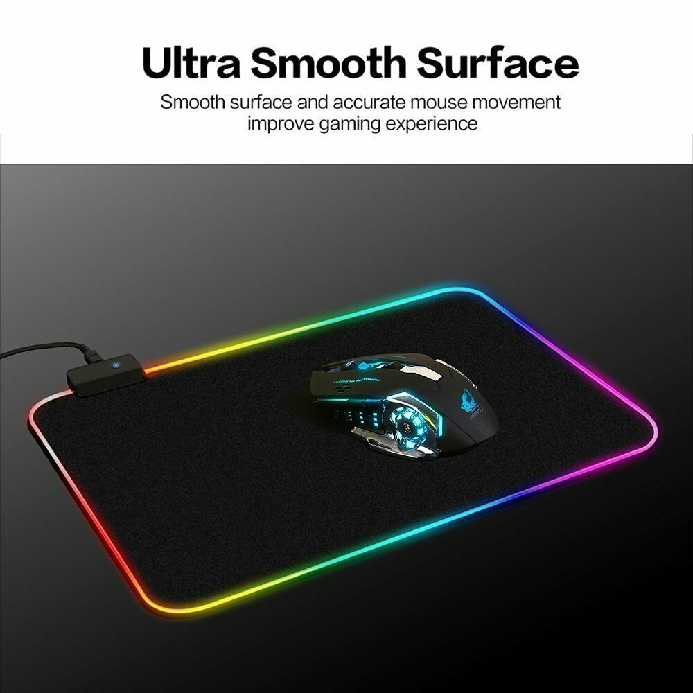 Gaming mouse and mouse pad with RGB lighting on a black background