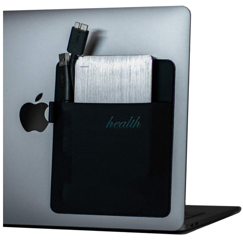 Silver laptop with Apple logo and 'health' decal on a white background