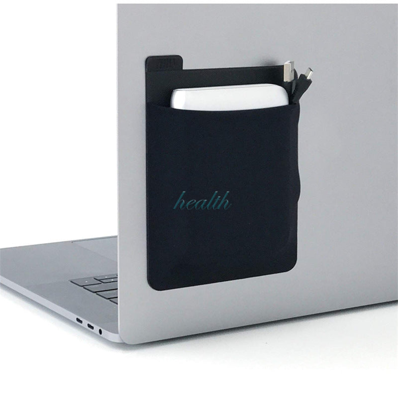 Black pouch with 'health' embroidery on a laptop