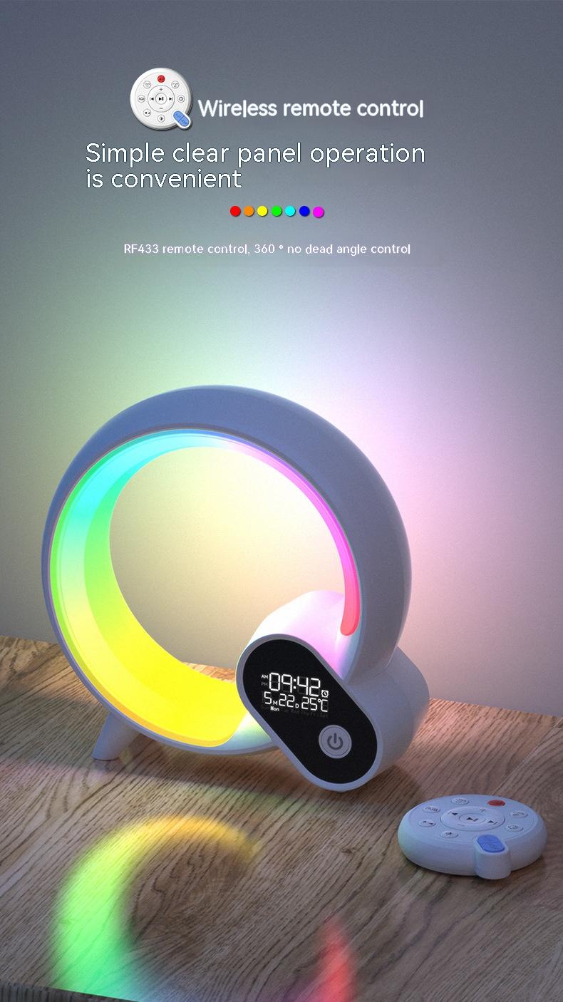 Colorful round light device with remote control on a wooden surface