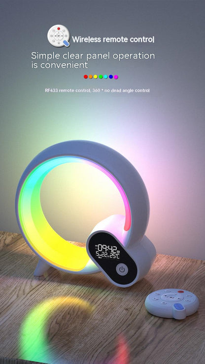 Colorful round light device with remote control on a wooden surface