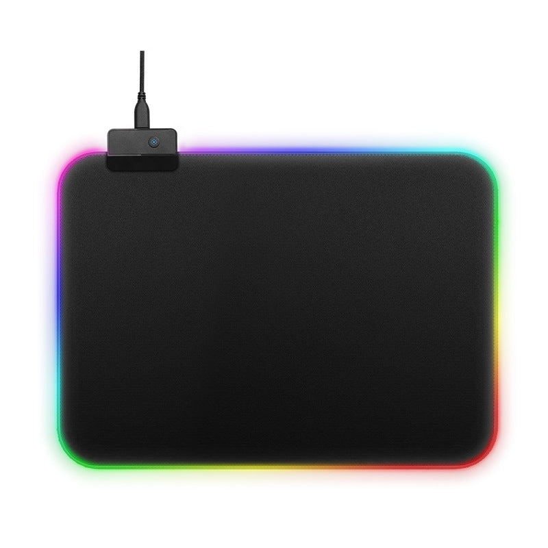 Black mouse pad with RGB lighting on a white background