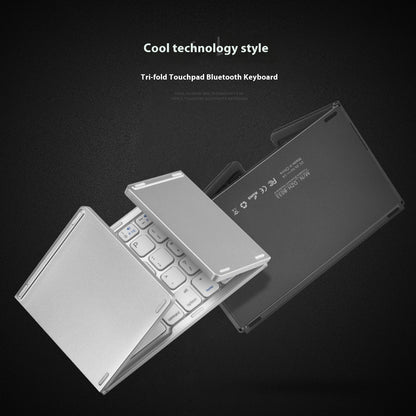 Tri-fold touchpad Bluetooth keyboard on a black background with text 'Cool technology style'.