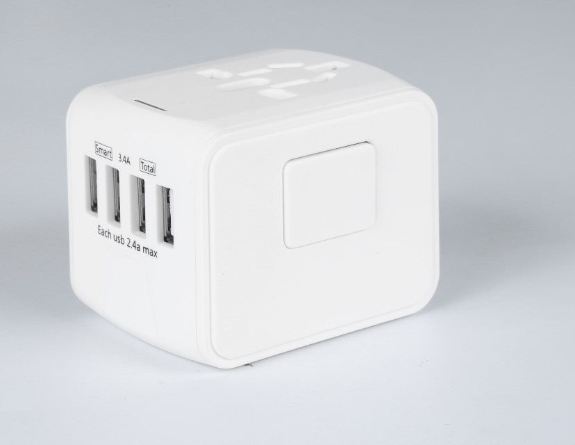 White cube-shaped USB hub with multiple ports on a light gray background