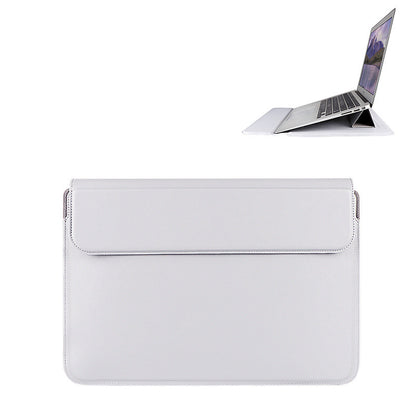 White laptop sleeve with a laptop partially visible on a white background