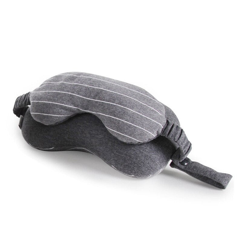 Gray sleep mask with striped pattern on a white background