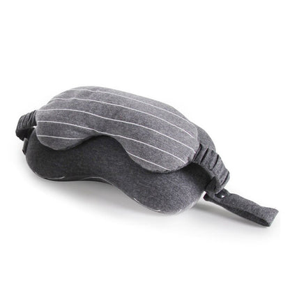 Gray sleep mask with striped pattern on a white background