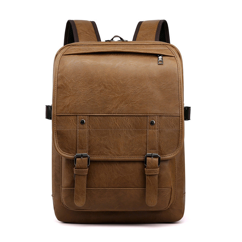 Brown leather backpack on a white background