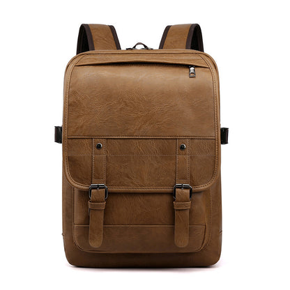 Brown leather backpack on a white background
