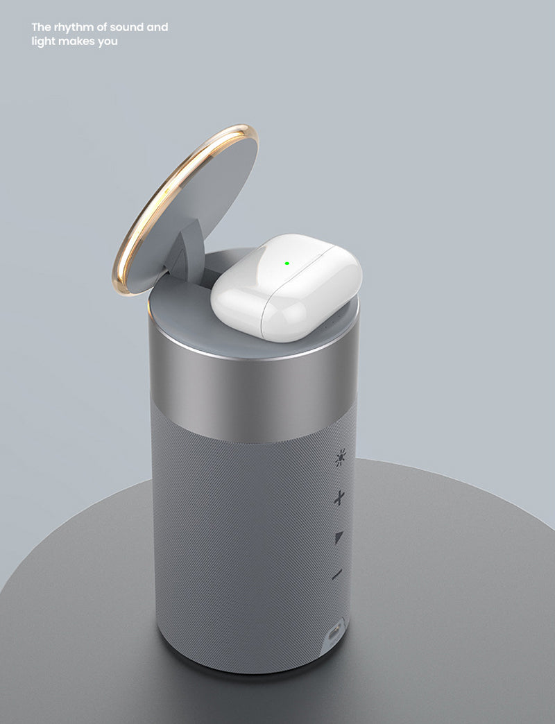 Wireless earbuds in a charging case on a gray surface with a light gray background