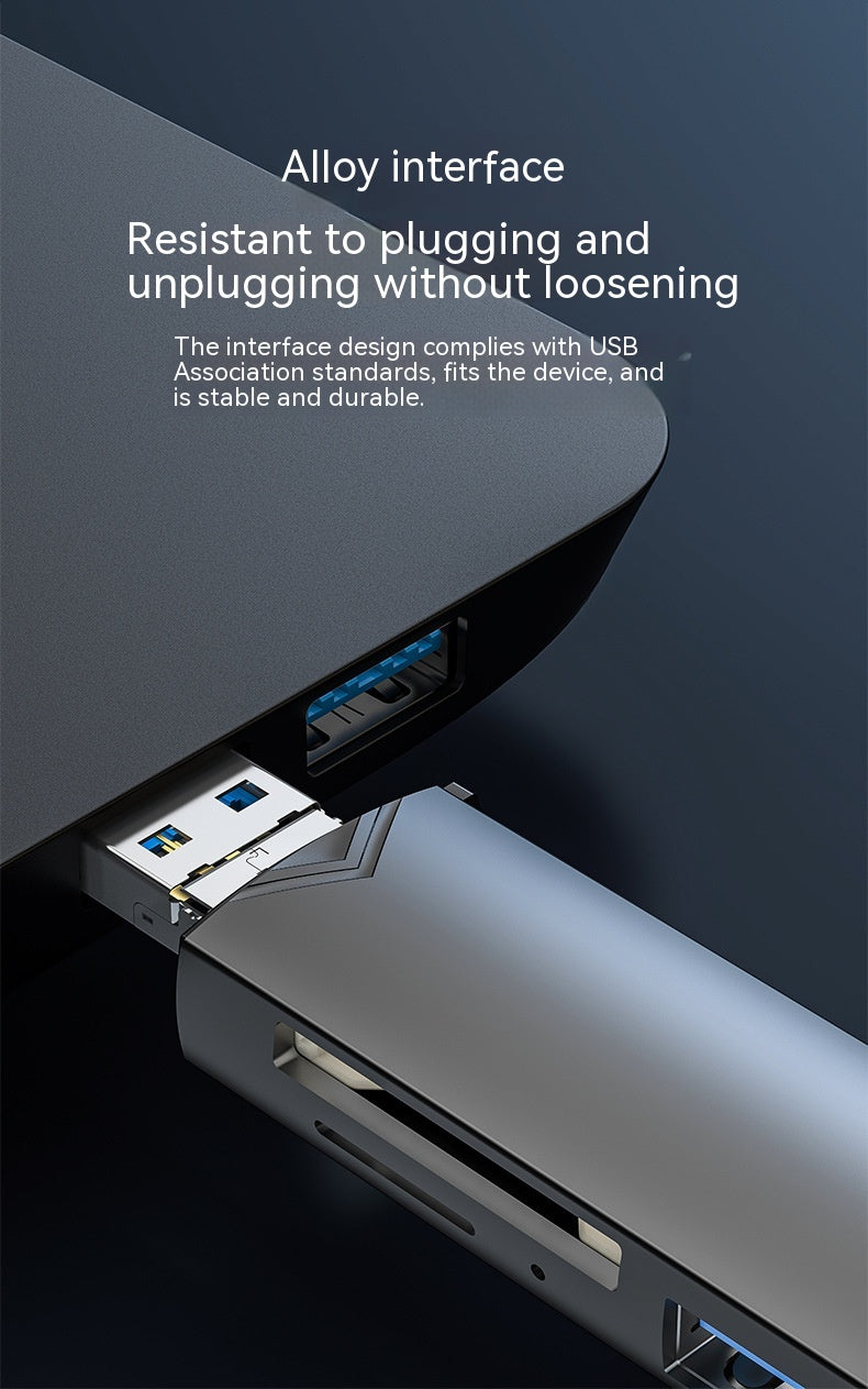 USB interface with text about alloy interface design on a dark background