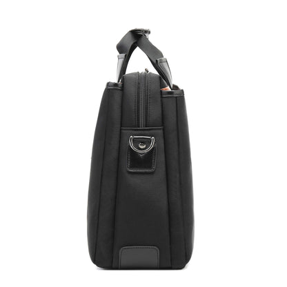 Black handbag with a shoulder strap on a white background