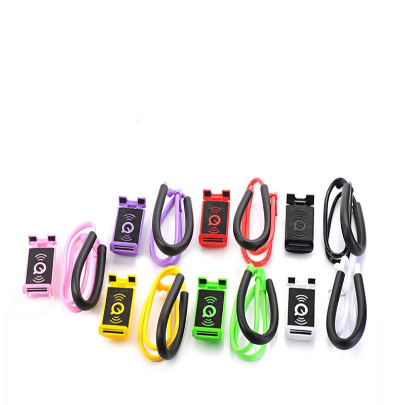 Set of colorful keychain fobs with wireless charging symbols on a white background