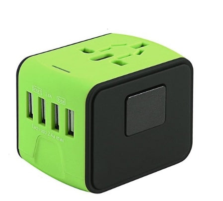 Green and black travel adapter on a white background