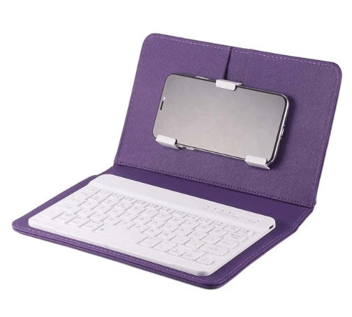 Purple case with white keyboard for a tablet on a white background