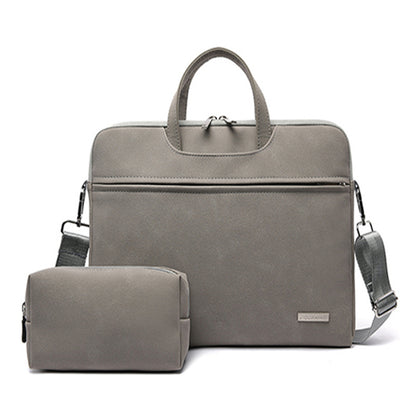 Gray travel bag with shoulder strap and smaller pouch on a white background
