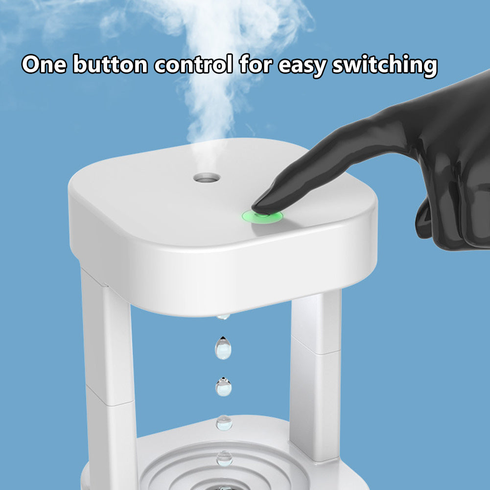 White humidifier with a green button being pressed, against a blue background.