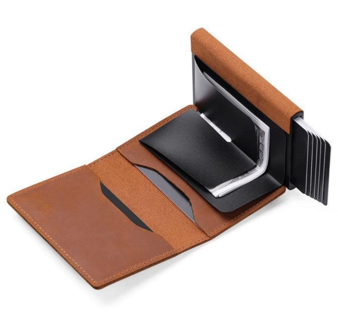 Brown leather wallet with a black cardholder on a white background