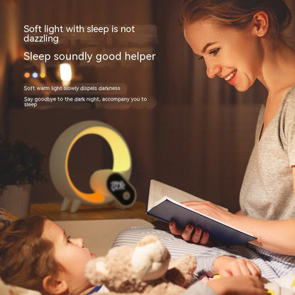 Woman reading a book to a child with a soft light in the background