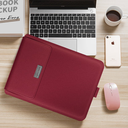 Red laptop sleeve on a desk with a laptop, phone, and mouse.