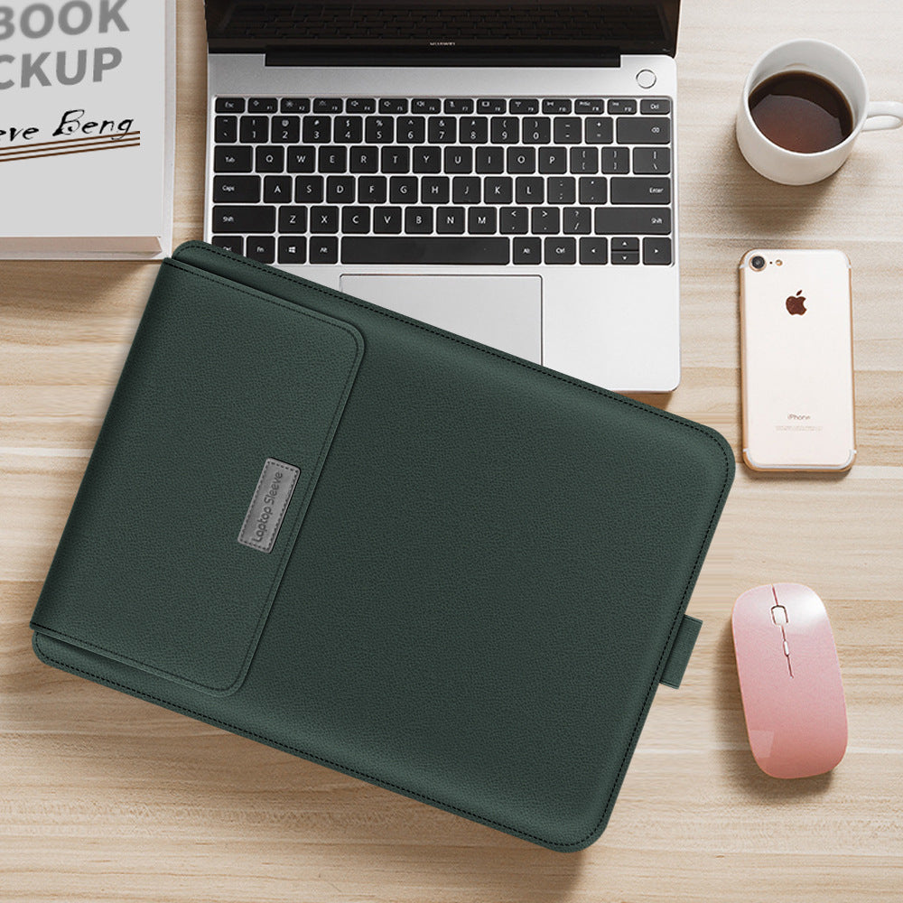 Green laptop sleeve on a desk with a laptop, phone, and mouse.