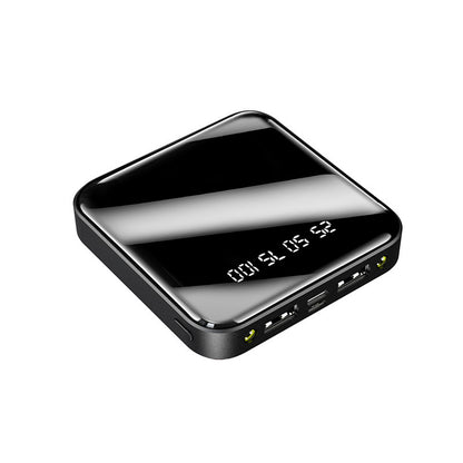 Black electronic device with digital display on a white background