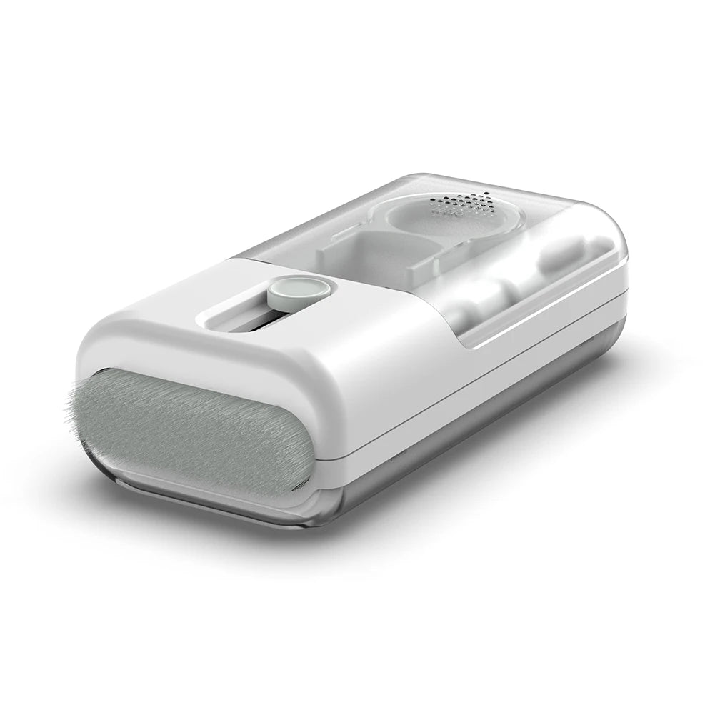 White electronic device with a brush on a white background
