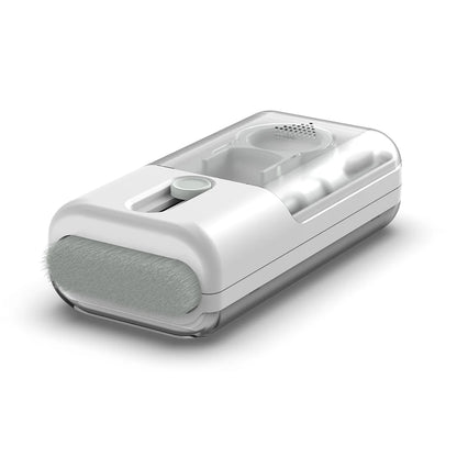 White electronic device with a brush on a white background